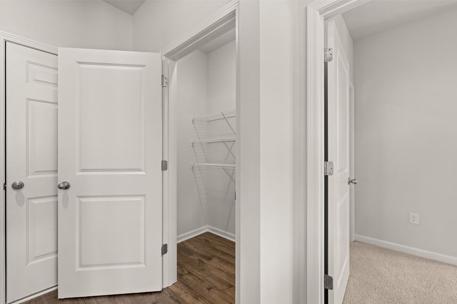 Representative unfurnished interior of a home built from the Mansfield by D.R. Horton in Southwind Village, Evans (Image 17).