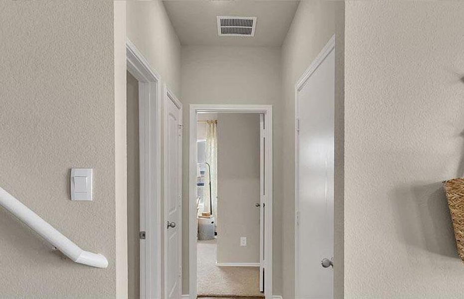 Hall featuring a textured wall Hall featuring a textured wall