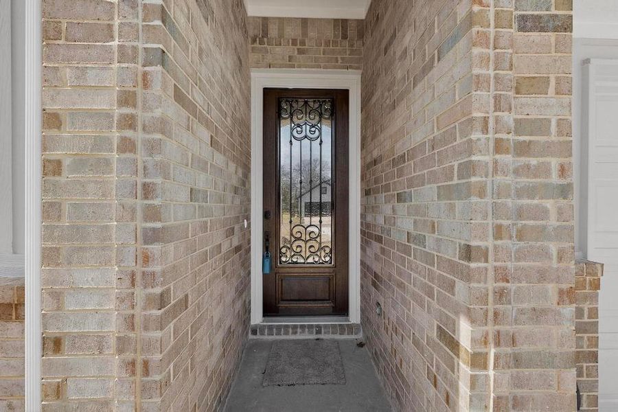 Entrance to property with brick siding Entrance to property with brick siding
