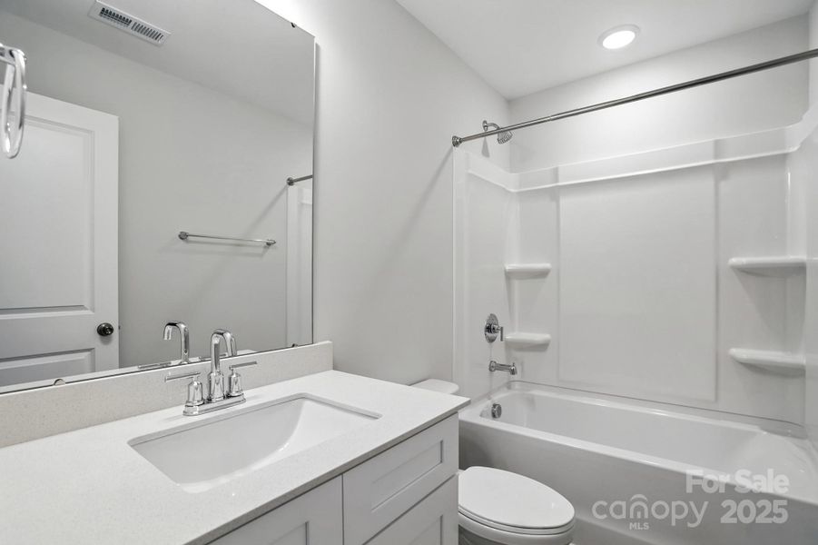 Furnished interior view inside a new home in Harrisburg Village Townhomes, Harrisburg (Image 7).