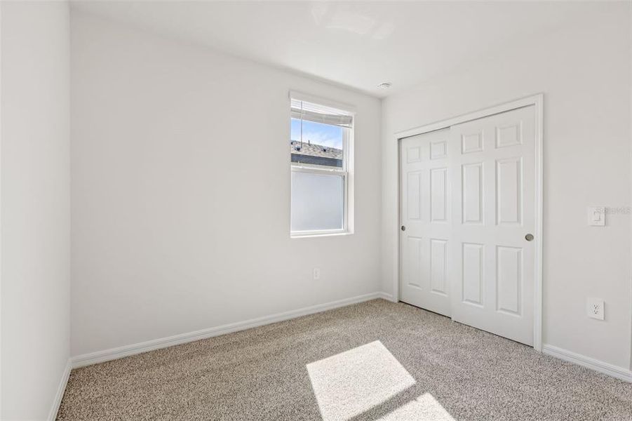 Spacious, unfurnished interior of a new home in Bradbury Creek - Signature Series, Haines City (Image 23).