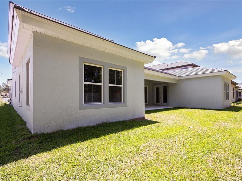 Front exterior of a new home in Crestwood Estates, Valrico, FL, highlighting curb appeal (Image 24). Front exterior of a new home in Crestwood Estates, Valrico, FL, highlighting curb appeal (Image 24).