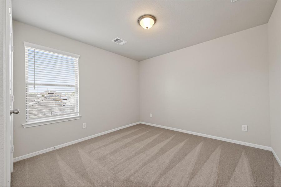 Spacious, unfurnished interior of a new home in Woodland Lakes, Huffman (Image 40).