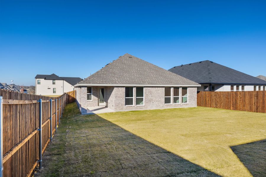 Exterior details and patio area of a home in Elevon, Lavon (Image 23).