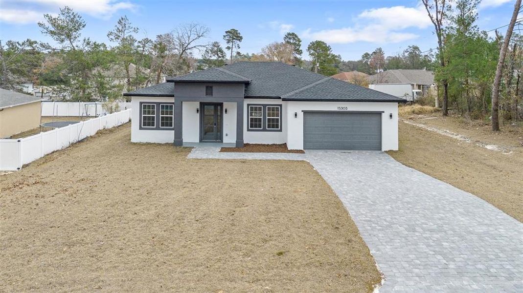 Front exterior of a new home in , Ocala, FL, highlighting curb appeal (Image 19).