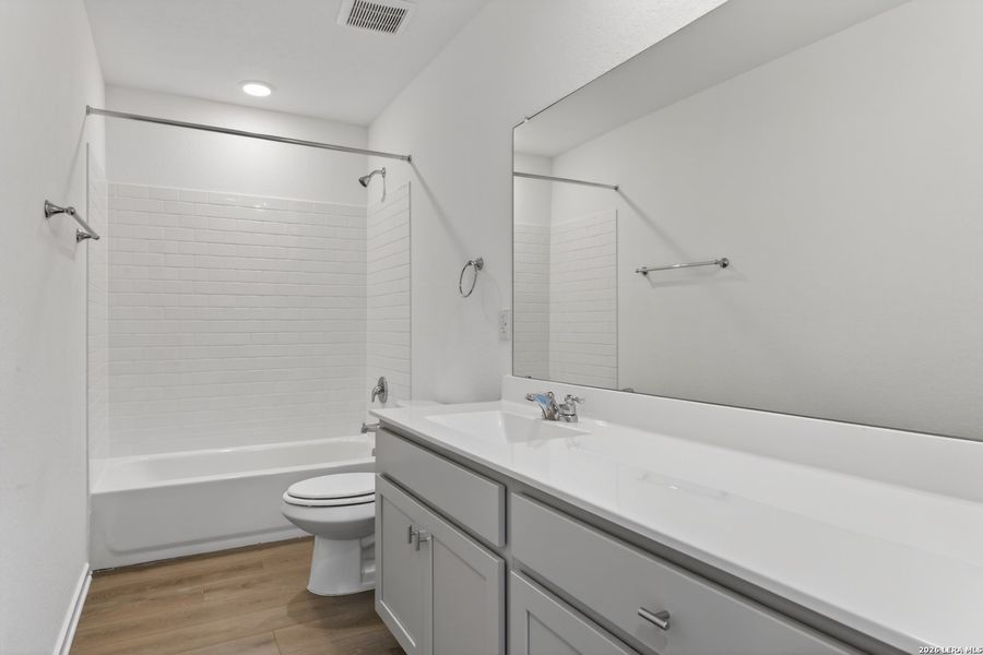 Furnished interior view inside a new home in Hennersby Hollow, San Antonio (Image 9).