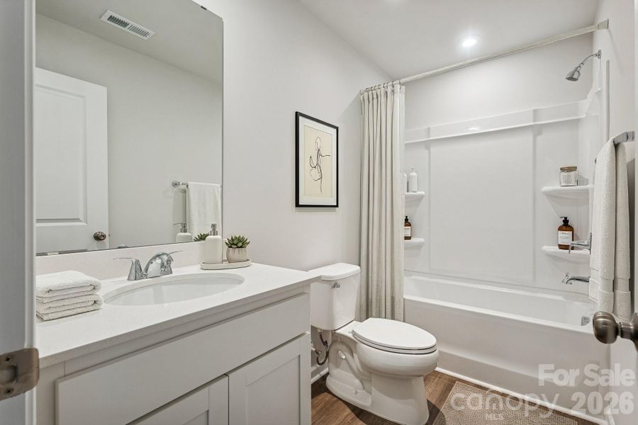 Example Photo Example Photo