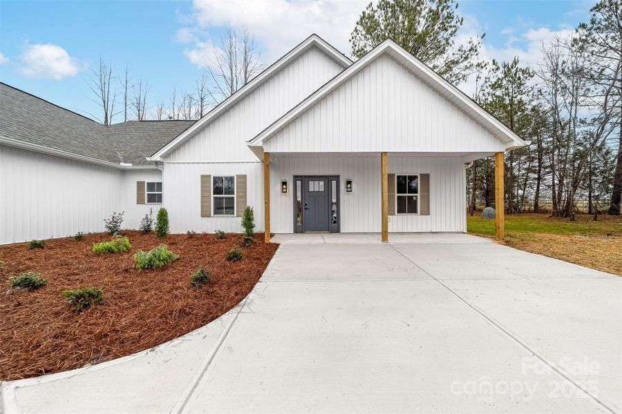 Front exterior of a new home in , Cherryville, NC, highlighting curb appeal (Image 2). Front exterior of a new home in , Cherryville, NC, highlighting curb appeal (Image 2).