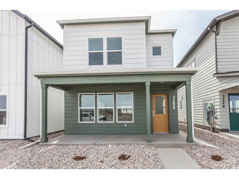 Exterior details and patio area of a home in Bloom Trailblazer Collection - Single Family Homes, Fort Collins (Image 2). Exterior details and patio area of a home in Bloom Trailblazer Collection - Single Family Homes, Fort Collins (Image 2).