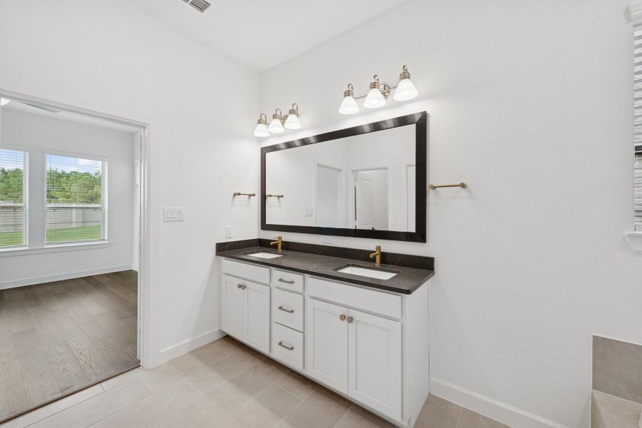 Furnished interior view inside a new home in Prairieland Village 40' Homesites, Cypress (Image 2).