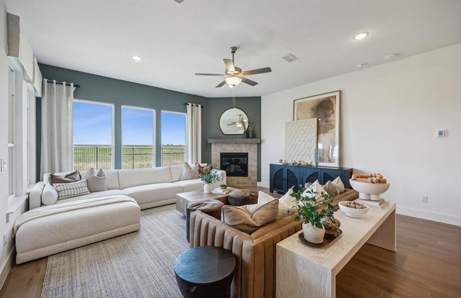 *Actual home, furniture not included - Spacious gathering room with large windows *Actual home, furniture not included - Spacious gathering room with large windows