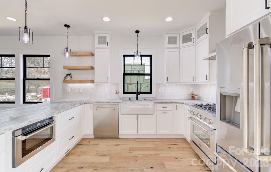 Furnished interior view inside a new home in , Hendersonville (Image 17).