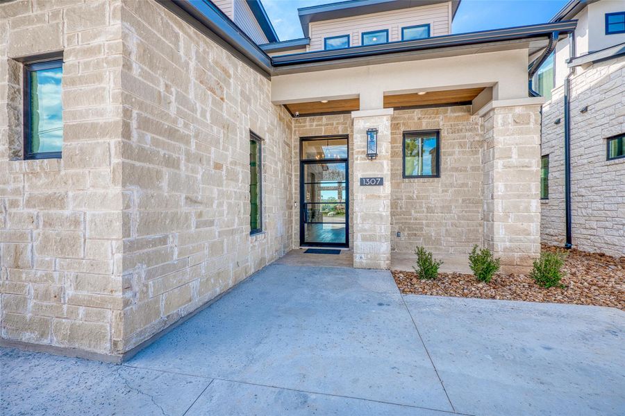 Step inside and view elegant lake living.