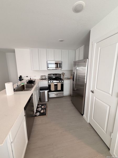 Furnished interior view inside a new home in Torian Village, San Antonio (Image 24).