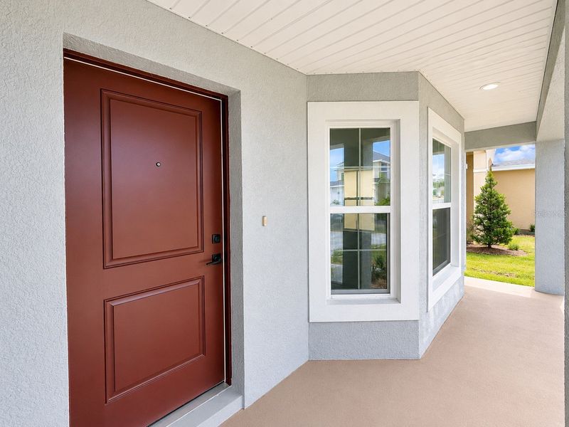 Exterior details and patio area of a home in Harmony Central, St. Cloud (Image 3).