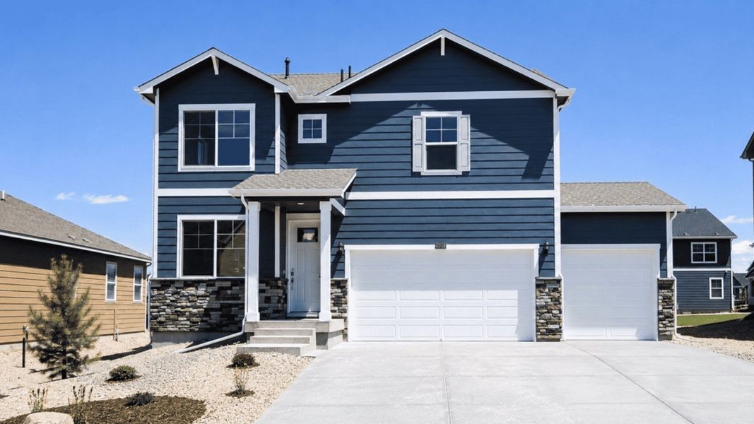 Front exterior of a new home in Spring Valley Ranch, Elizabeth, CO, highlighting curb appeal (Image 1). Front exterior of a new home in Spring Valley Ranch, Elizabeth, CO, highlighting curb appeal (Image 1).