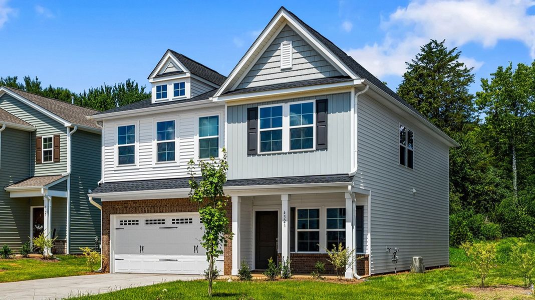 Front exterior of a new home in Hanes Lake, Winston-Salem, NC, highlighting curb appeal (Image 2). Front exterior of a new home in Hanes Lake, Winston-Salem, NC, highlighting curb appeal (Image 2).