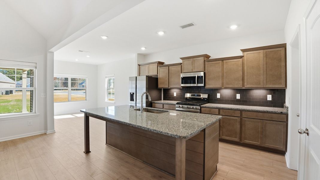 large island. will accommodate 4-counter height barstools large island. will accommodate 4-counter height barstools