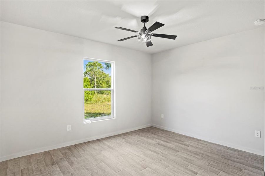 Spacious, unfurnished interior of a new home in , Okeechobee (Image 22).