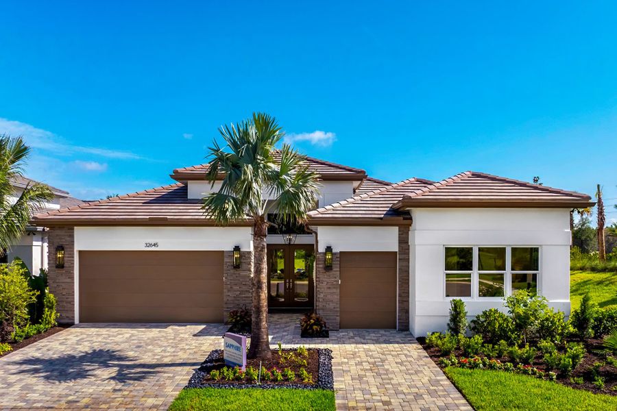 Representative exterior photo of a completed home built from the Sapphire by GL Homes in Valencia Ridge (55+), Wesley Chapel, FL (Image 2).