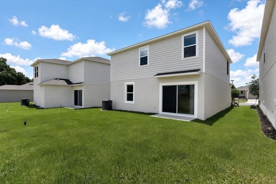 Exterior details and patio area of a home in Waterstone, Groveland (Image 4).