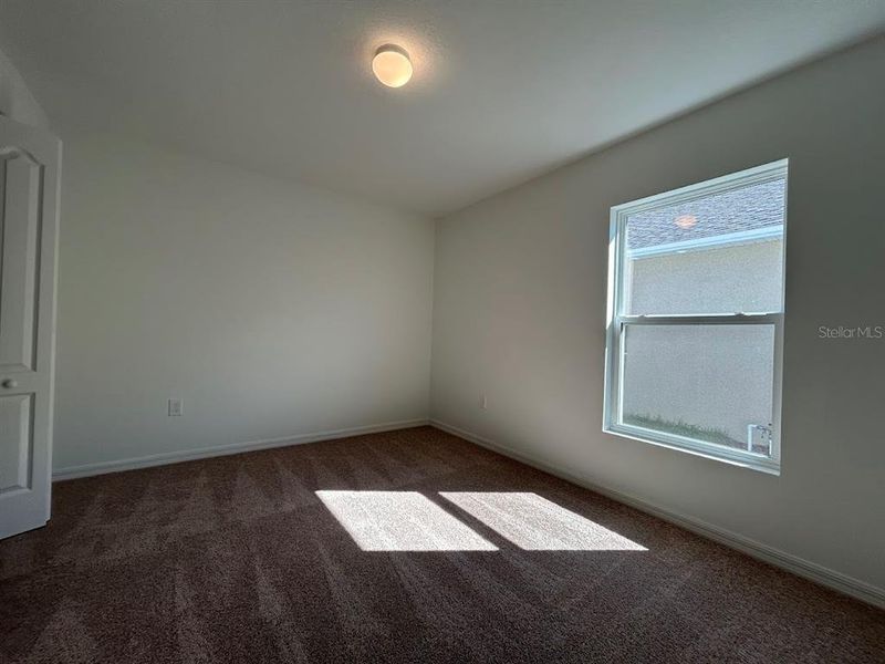 Spacious, unfurnished interior of a new home in James Farms, Bartow (Image 7).