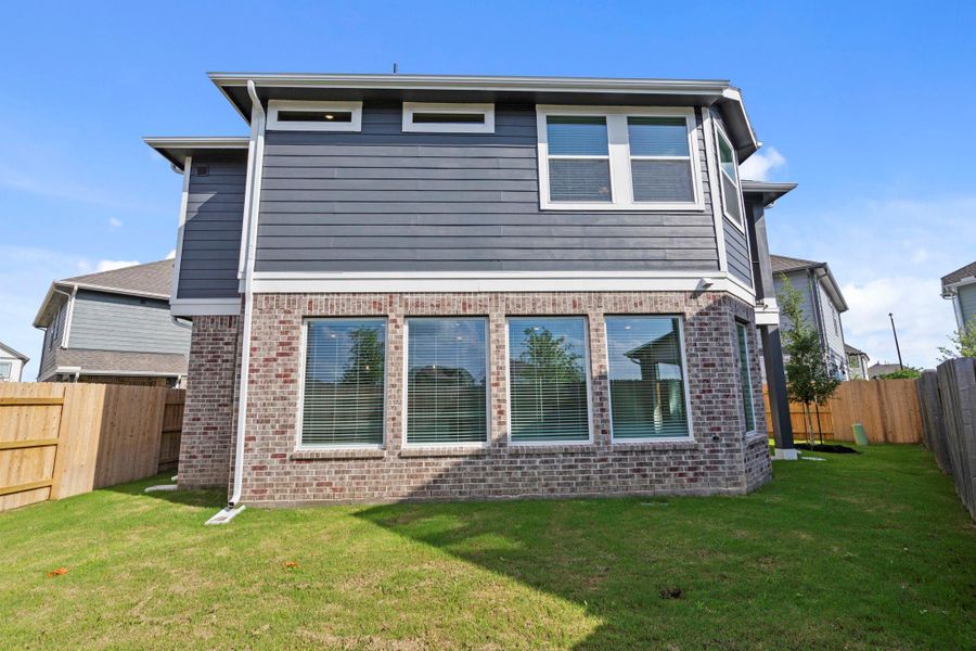 Exterior details and patio area of a home in Elyson, Katy (Image 23).
