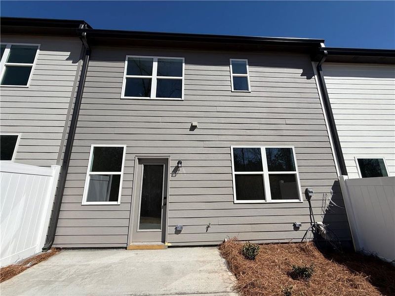 Exterior details and patio area of a home in The Towns at Auburn Station East, Auburn (Image 9).