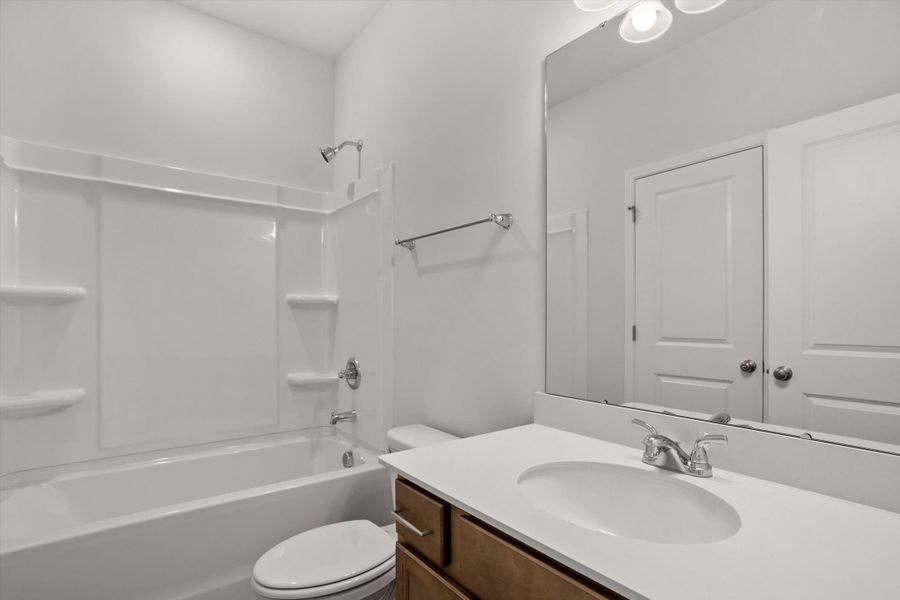 Furnished interior view inside a new home in Cambridge Reserve, Angier (Image 13).