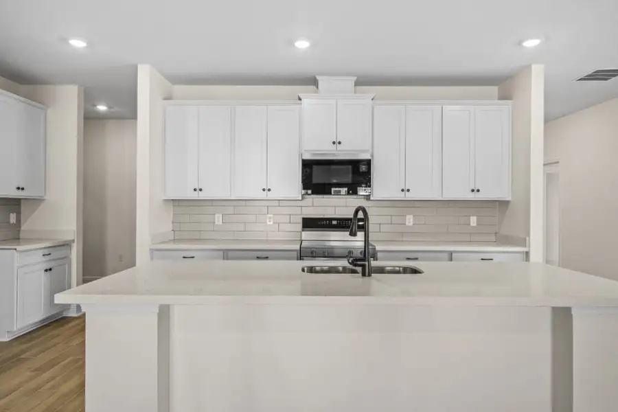 Furnished interior view inside a new home in Natureview, Freeport (Image 5).