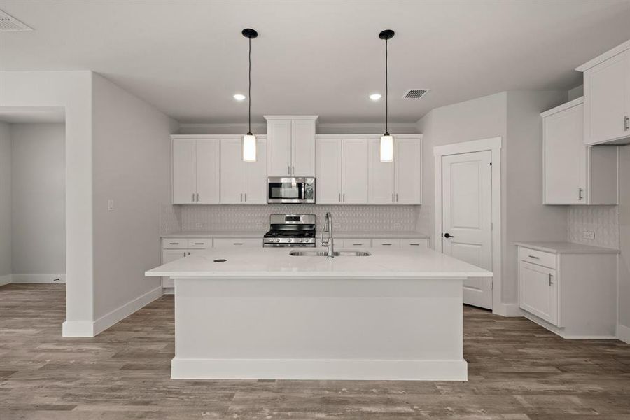 The spacious island is the focal point of your new dream kitchen offering the perfect place for friends and family to gather round. The spacious island is the focal point of your new dream kitchen offering the perfect place for friends and family to gather round.