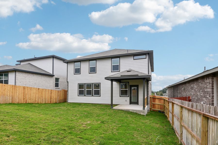 Back exterior of the Red River floorplan at a Meritage Homes community.