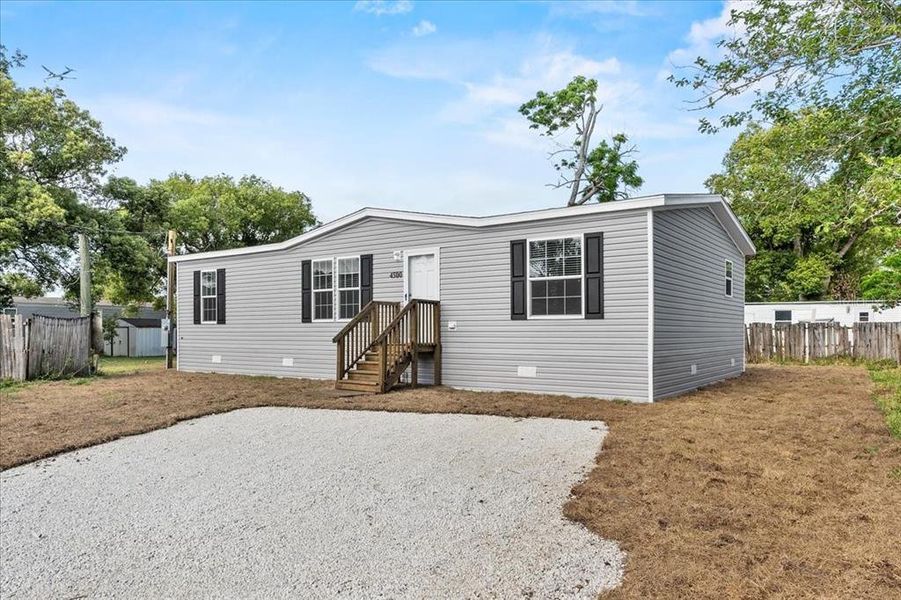 Exterior details and patio area of a home in , Holiday (Image 23).