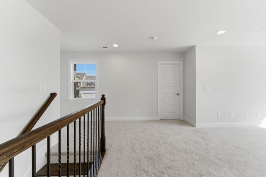 Representative unfurnished interior of a home built from the Fairfield Lux by Keystone Homes NC in Weybridge, Burlington (Image 100).