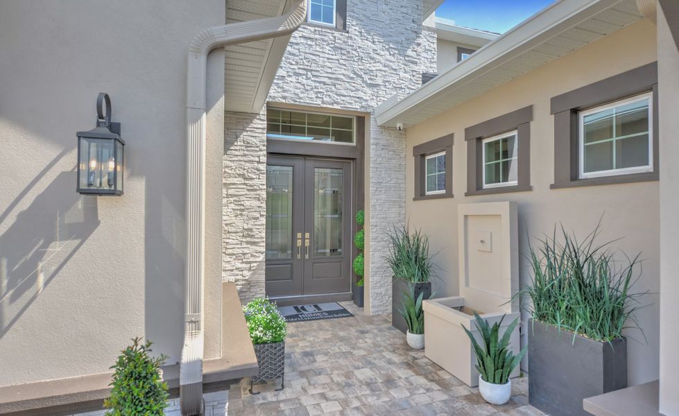 Exterior details and patio area of a home in The Conservatory at Hammock Beach, Palm Coast (Image 4).