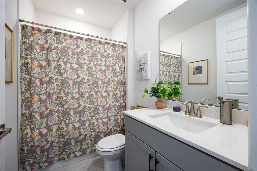 Furnished interior view inside a new home in The Grove at Stuart Crossing - Signature Series, Bartow (Image 19). Furnished interior view inside a new home in The Grove at Stuart Crossing - Signature Series, Bartow (Image 19).