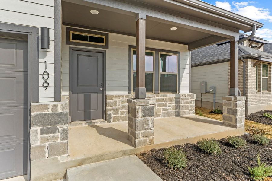 Exterior details and patio area of a home in Prairie Winds, Hutto (Image 3).