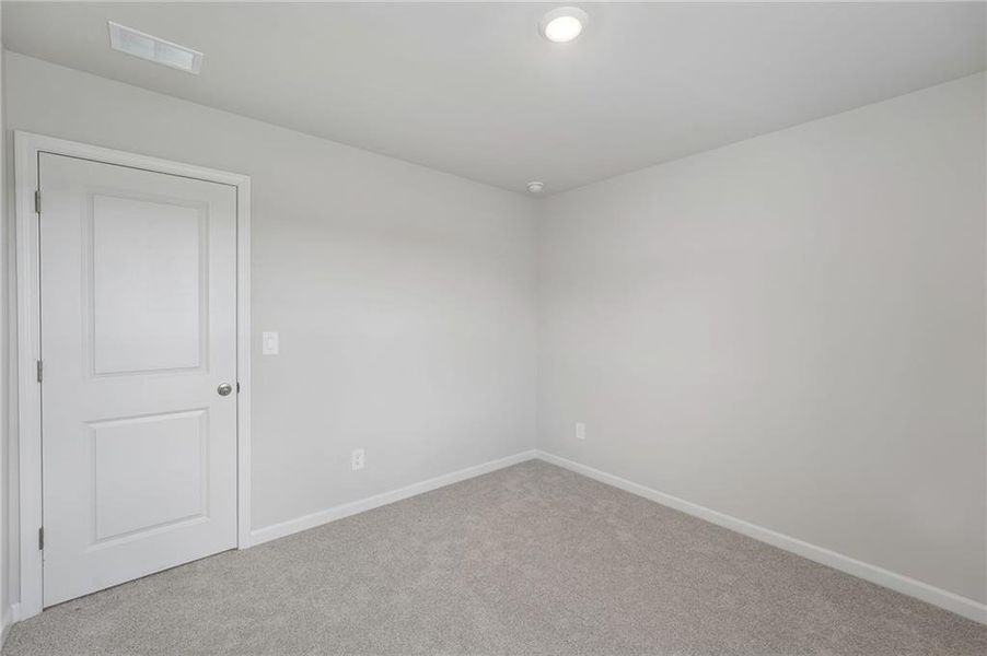 Spacious, unfurnished interior of a new home in Northwoods at Mirror Lake, Villa Rica (Image 21).