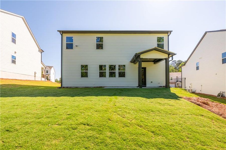 Exterior details and patio area of a home in Cambridge at Steels Bridge: Steels Bridge, Canton (Image 23).