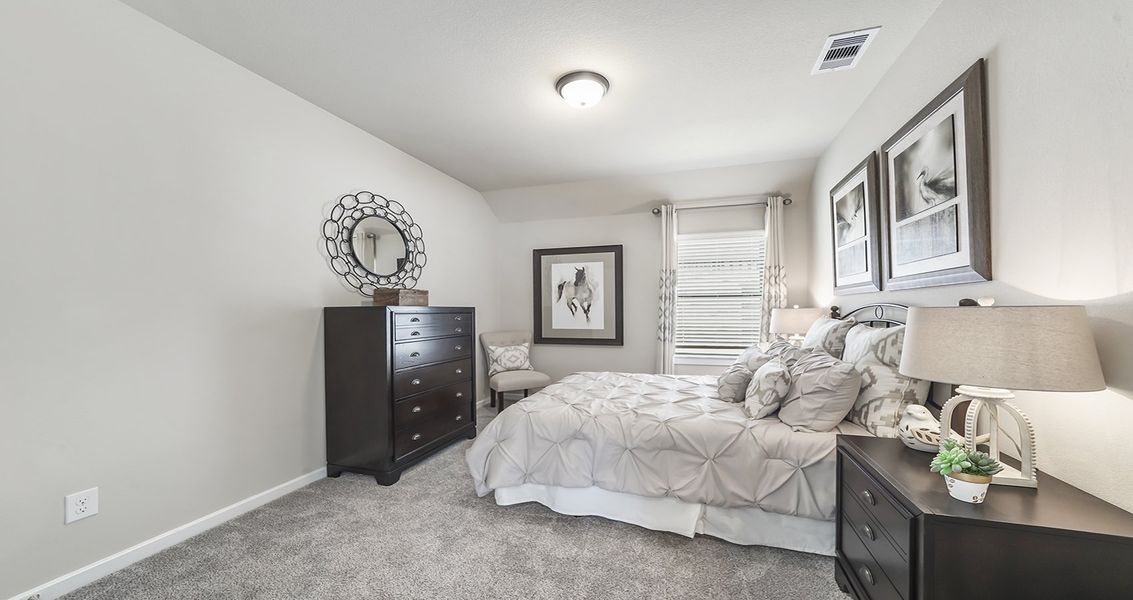 Furnished interior view inside a new home in Wood Leaf Reserve, Tomball (Image 27).