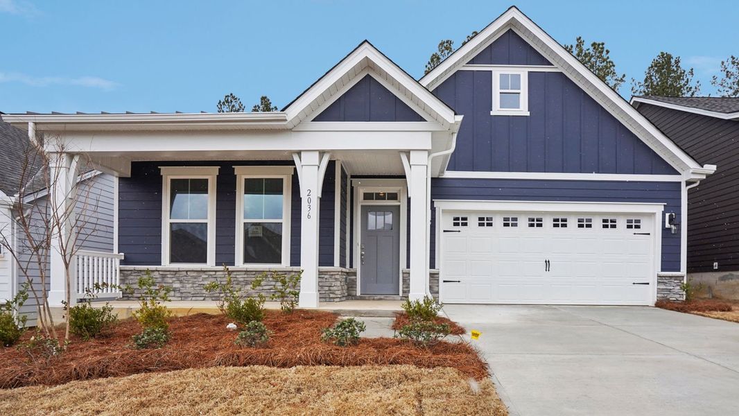 Front exterior of a new home in Westport, York, SC, highlighting curb appeal (Image 1). Front exterior of a new home in Westport, York, SC, highlighting curb appeal (Image 1).