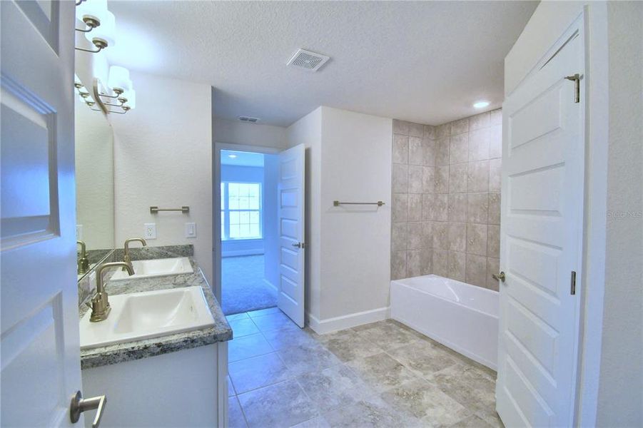 Furnished interior view inside a new home in Cadence Crossing, Auburndale (Image 9).