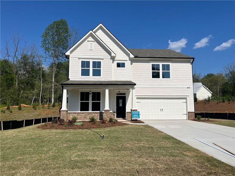 Front exterior of a new home in , Canton, GA, highlighting curb appeal (Image 2). Front exterior of a new home in , Canton, GA, highlighting curb appeal (Image 2).