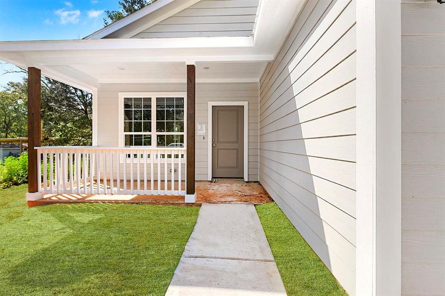 Cute county front porch.  Upon move in, Smart home package to be installed.  See details in listing and flyer in kitchen.