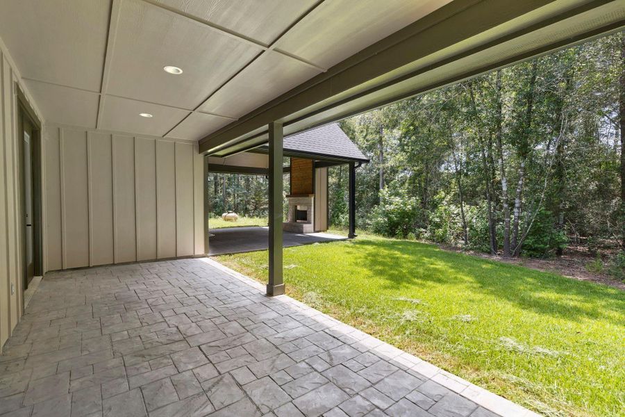 This patio is off the 1st floor game room and secondary bedrooms