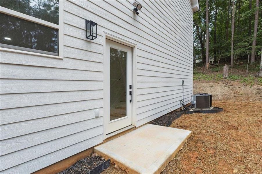 Front exterior of a new home in , Gainesville, GA, highlighting curb appeal (Image 1).