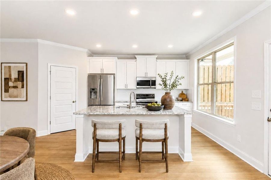 Furnished interior view inside a new home in Towns at Enclave, Lawrenceville (Image 11).
