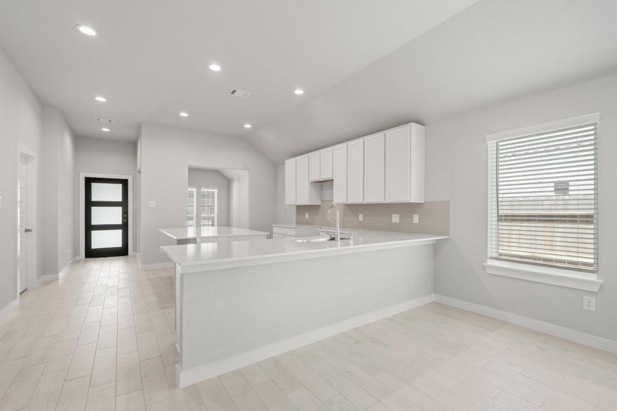 Furnished interior view inside a new home in Sunterra North, Katy (Image 8).