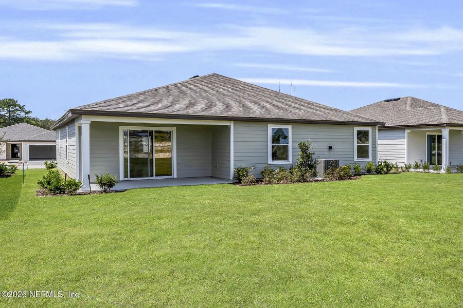 Exterior details and patio area of a home in Rolling Hills, Green Cove Springs (Image 3).