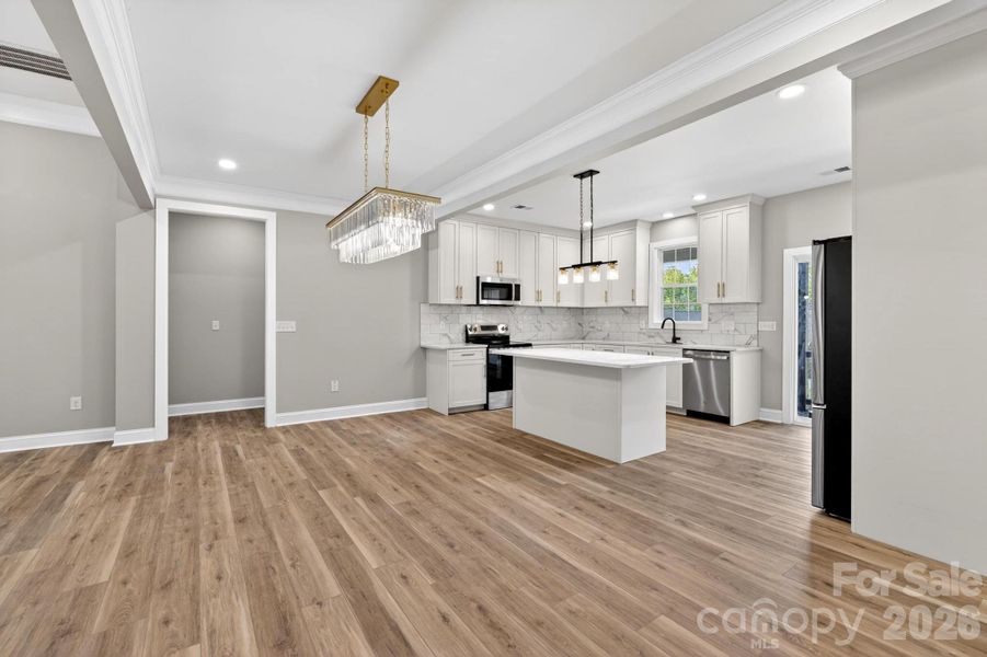 Furnished interior view inside a new home in , Lenoir (Image 9).